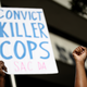 Black Lives Matter protesters demonstrate outside the office of Sacramento, Calif., District Attorney Anne Schubert on March 28, 2018, in Sacramento.